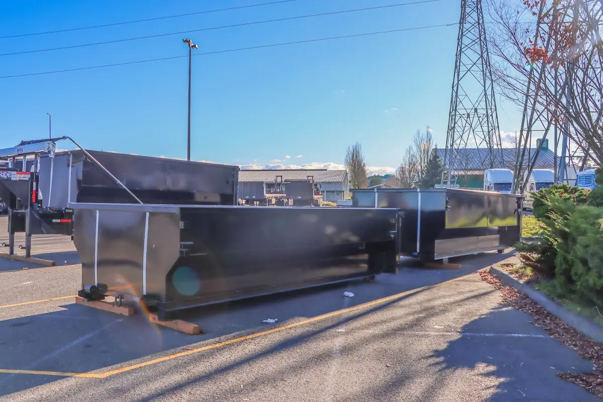 Roll-off dumpster ready for waste disposal at job site for Construction Dumpster Rental in Parsons